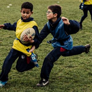 children playing tag rugby