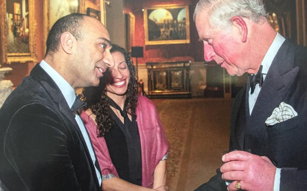 Prince Charles shaking hands with the Chairman of Sancton Wood School