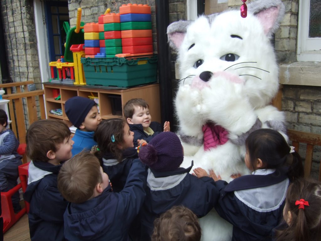 students with a big animal