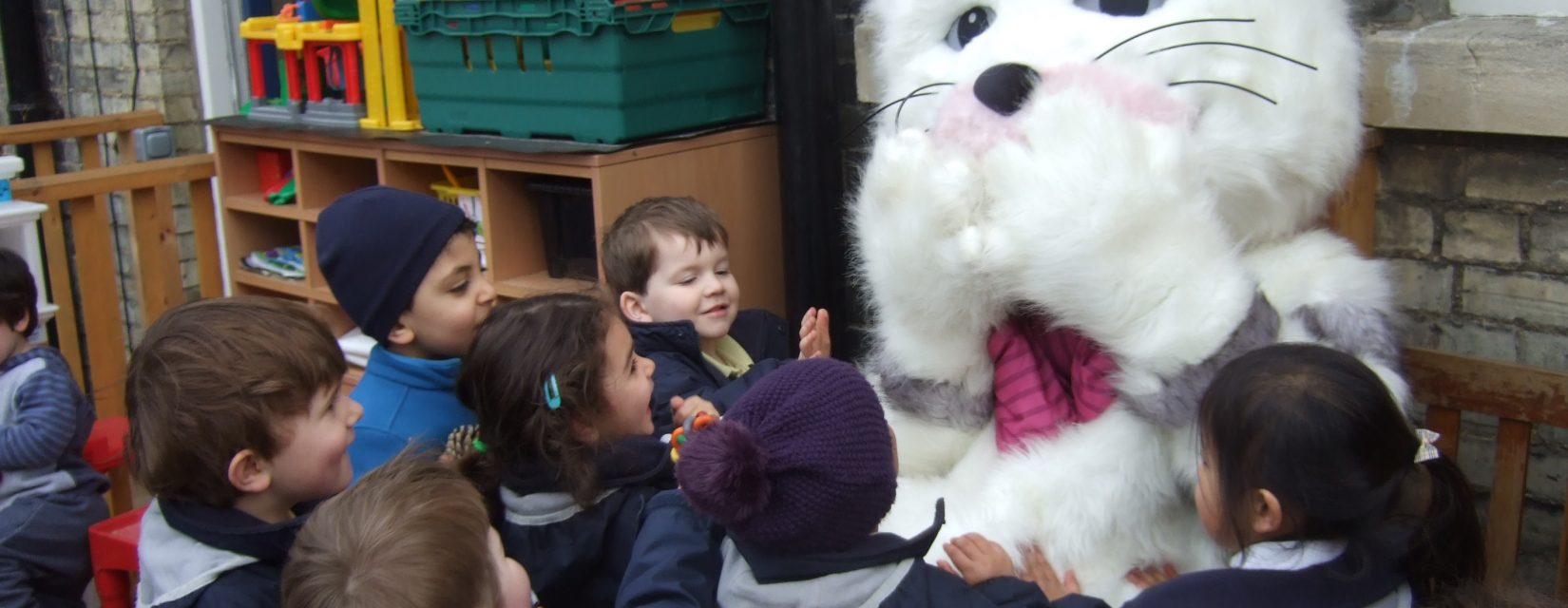 students with a big animal