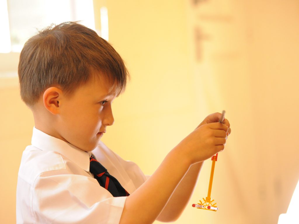 boy creating a model