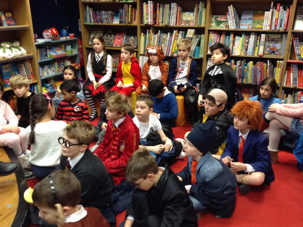 students sat in a library
