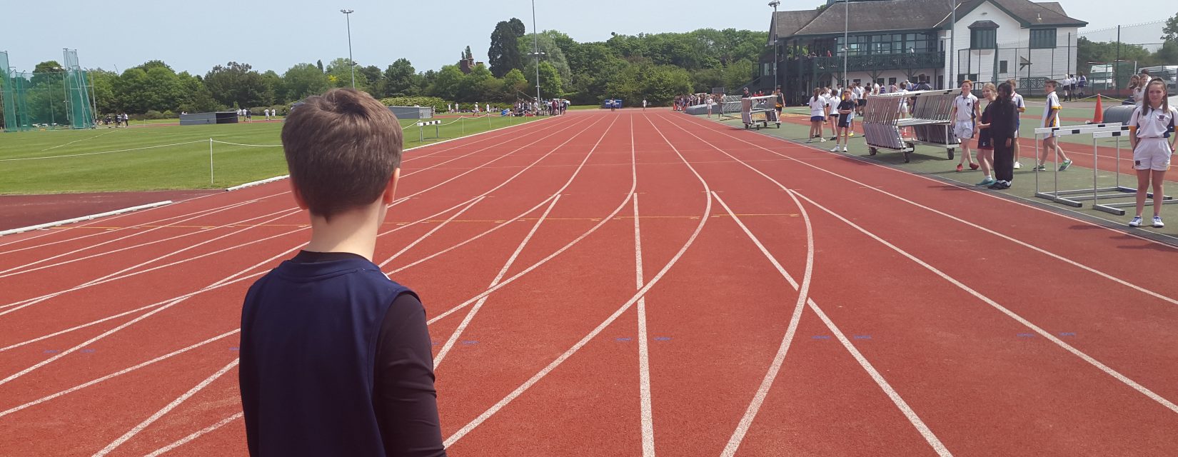 student on a running track