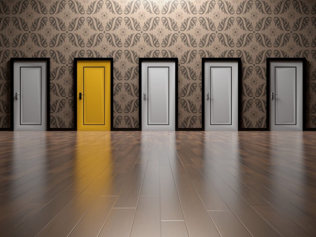 A range a white doors with 1 yellow door