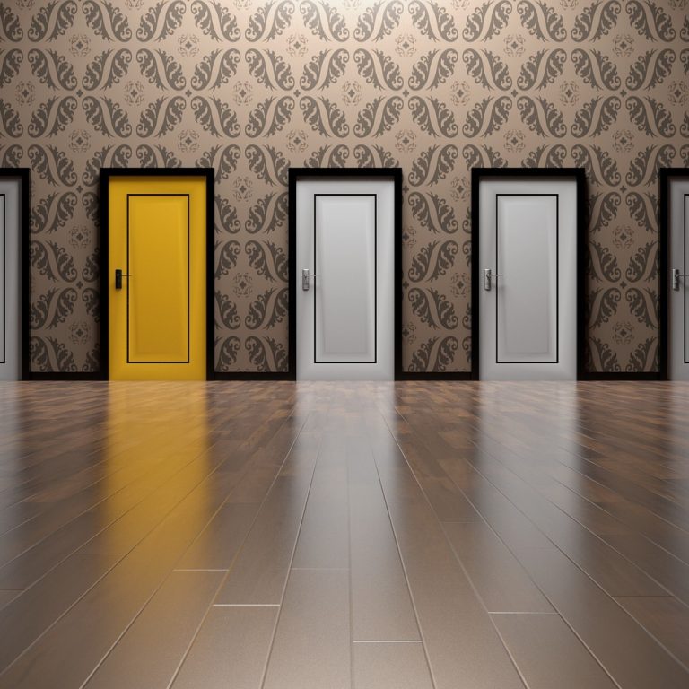 A range a white doors with 1 yellow door