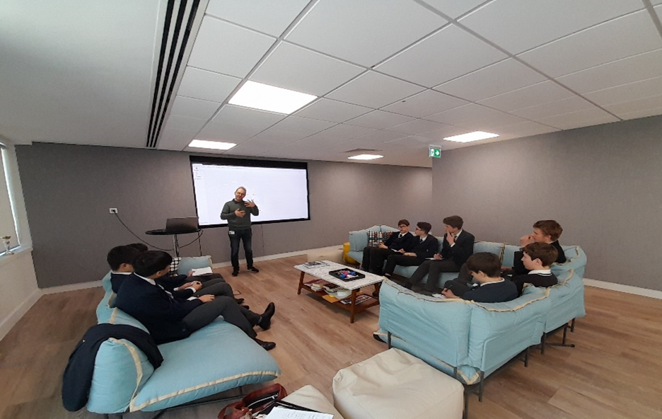 Students in an autonomous vehicle talk